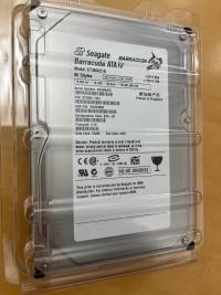 New Seagate Barracuda ATA IV 80GB Hard Drive Model ST380021A in protective plastic clamshell, showing technical label and P.N. 9T6006-003.