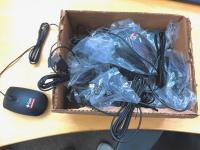 Sun Microsystems Oracle USB optical scroll mouse in black, featuring the Sun Oracle logo and a standard USB-A connector. 